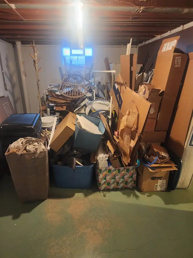 Roll-off dumpster container at job site for 4 Yard Dumpster Rental in Mead